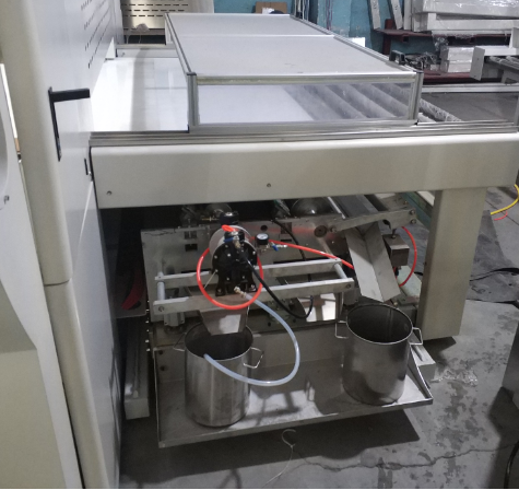 Paint reclaim system for auto oscillating spray machine